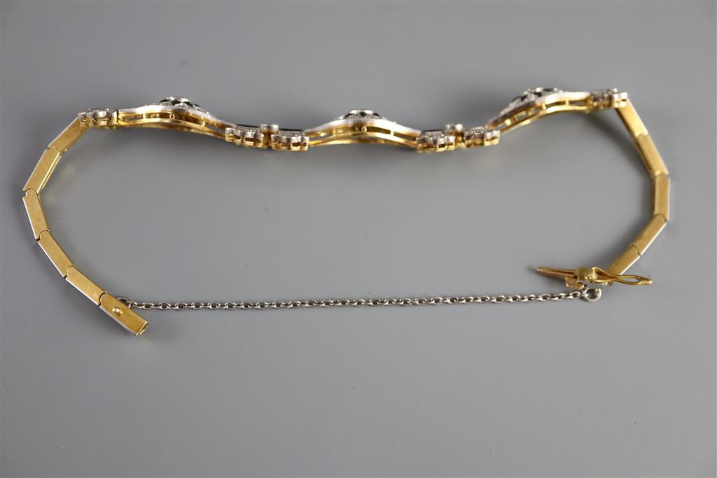 A 1920s gold and platinum, diamond and black onyx set bracelet, approx. 16cm,